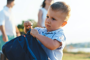 Sticker - boy zipping backpack