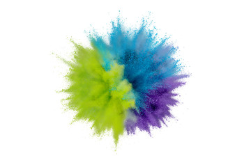 Wall Mural - Colored powder explosion on white background. Abstract closeup dust on backdrop. Colorful explode. Paint holi