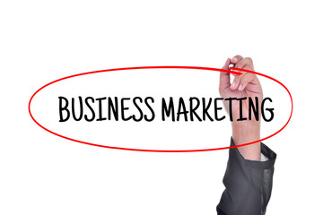 Hand writing a word BUSINESS MARKETING on white background