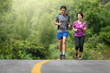 © toa555 - Asian middle aged couple  jogging exercise in park