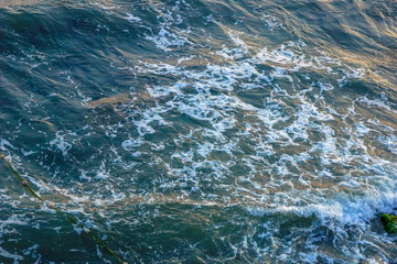 Wall Mural - sea waves foam sea  top view.