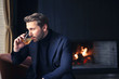 © Cavan Images - handsome man drink wine