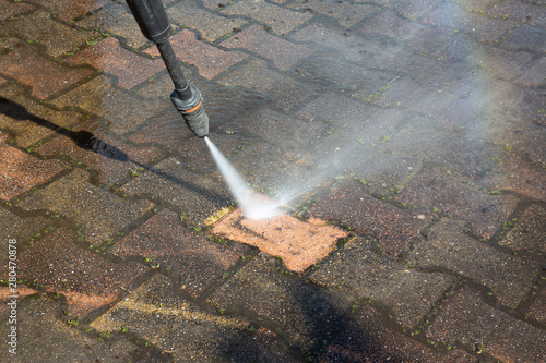 Outdoor floor clean driveway with pressure water jet