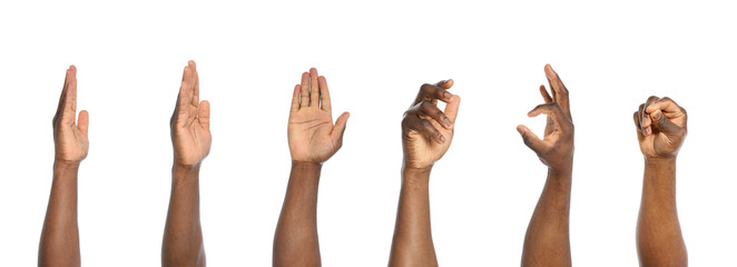 Wall Mural - african-american man extending hand for shake on white background, closeup