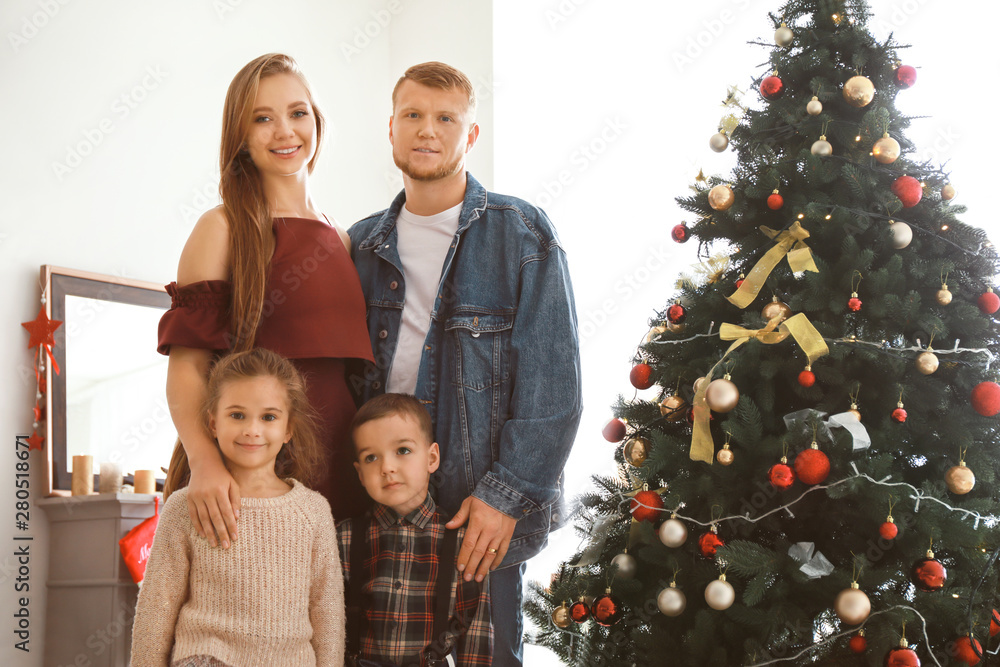 Happy family at home on Christmas eve