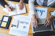 © Ngampol - Professional Business partner discussing ideas planning and presentation project at meeting working and analysis at workspace, financial and investment concept, collaborative teamwork analyze data