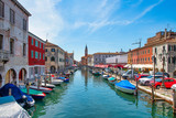 Fototapeta  - Chioggia Italy, on the Vena canal in the background the church of San Giacomo