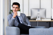 © Bangkok Click Studio - Businessman drinking coffee in office..