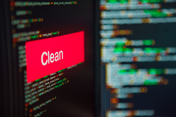 Wall Mural - programming language, clean inscription on the background of computer code.