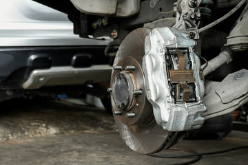 Wall Mural - New car brake system replacement, brake disc, brake caliper.