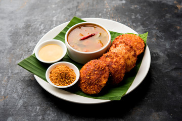 Wall Mural - Podi idli is a quick and easy snack made with leftover idly. served with sambar and coconut chutney. selective focus