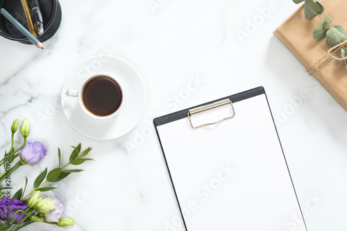 Flatlay Of Home Office Desk Workspace With Paper Clipboard Coffee
