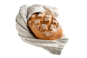 rye bread on a kitchen towel isolated on white background