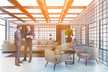 Wall Mural - Businessmen in wooden and metal waiting room