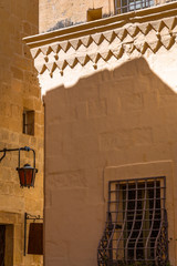 Wall Mural - Typical Windows and Lamps in Mdina. Exposure done in the beautiful medieval town of Mdina, Malta.