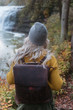 © Chelsea Victoria/Stocksy - A young woman exploring a park in autumn
