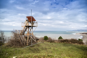 A tumbledown guard tower, outdated security measures and area security