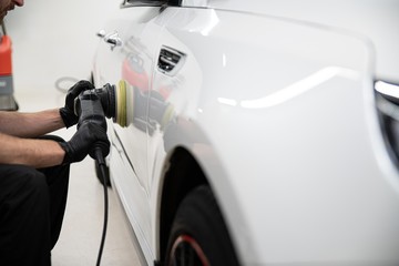 Polishing car with electric grinder