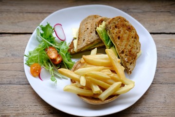 Wall Mural - close up avocado sandwich with cheese and french fries