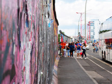 Tourists At The Berlin Wall. Berlin, Germany