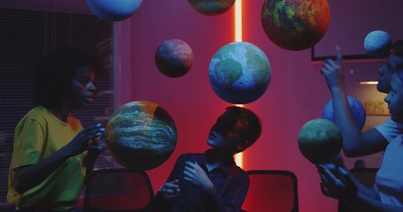 Wall Mural - Teacher explaining astronomy to students