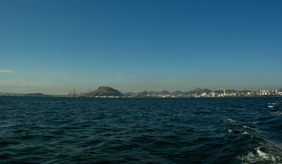 Canvas Print - City, sea and blue sky