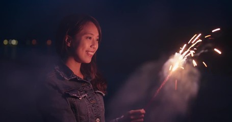 Canvas Print - Woman play sparkler in the evening