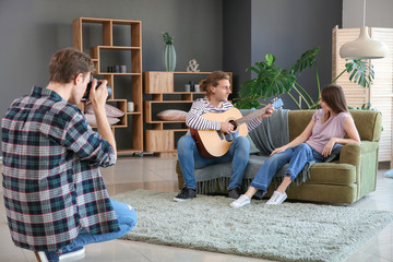 Wall Mural - Professional photographer working with models in studio