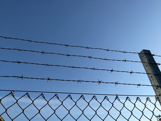 fence with barbed wire