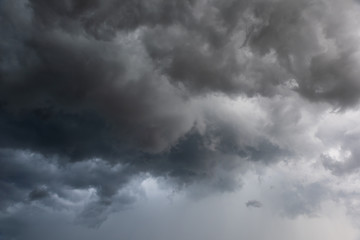 Wall Mural - motion of dark sky and black clouds, dramatic cumulonimbus cloud with rainy