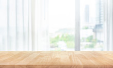 Empty Of Wood Table Top On Blur Of White Curtain With Window View Background