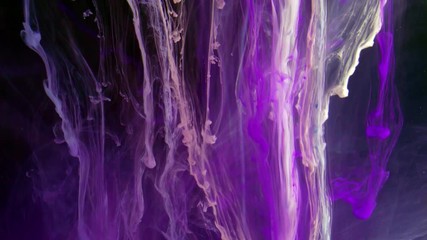 Wall Mural - Slow motion of Liquid ink on black background. 