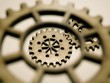 Three gear mechanism close up on white background