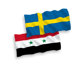 National vector fabric wave flags of Sweden and Syria isolated on white background. 1 to 2 proportion.