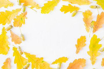 Wall Mural - flat lay composition with colorful autumn leaves and acorns on a white background