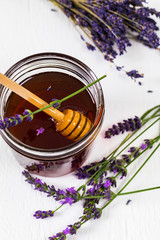 Wall Mural - Lavender Herbal Honey with Lavender Flowers. Selective focus.