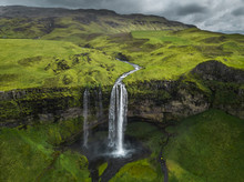 Aerial view of beautiful Seljalandsfoss waterfall in Iceland during the spring. 