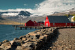 Old red classic Icelandic houses at the fish port of Eskifjordur. Easternfjords Iceland.
