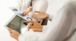 © yurolaitsalbert - business team using digital tablet, working with the financial s