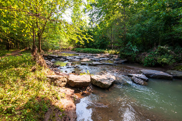nine mile run, a stream in frick park, pittsburgh, pennsylvania, usa which runs through the park and