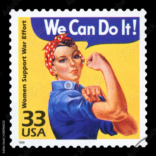 Cuadros en Lienzo UNITED STATES - CIRCA 1999 : Canceled US Postage stamp showing an image of Rosie The Riveter commemorating the American woman who worked in factories during the World War II, circa 1999