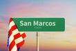 San Marcos – Texas. Road or Town Sign. Flag of the united states. Sunset oder Sunrise Sky. 3d rendering