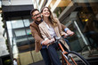 © NDABCREATIVITY - Portrait of happy smiling business people talking in the city