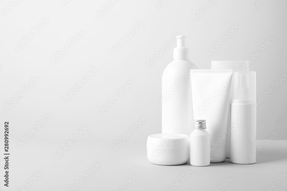 Set of cosmetic products on light background