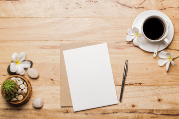 Coffee with notes And cactus on a wooden table