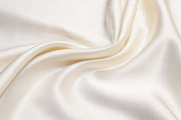 Wall Mural - Texture of ivory silk fabric. Background, pattern.