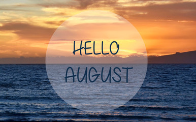hello august greeting on ocean sunset background.summer concept.selective focus.