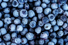 Frozen blueberries texture. Frozen berries