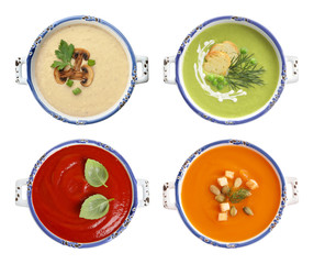 Set of different fresh homemade soups on white background, top view