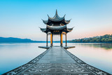 Jixian pavilion during sunrise in Hangzhou, Zhejiang province, China with all Chinese words on it only introduces itself which means "Jixian Pavilion "without advertisement.